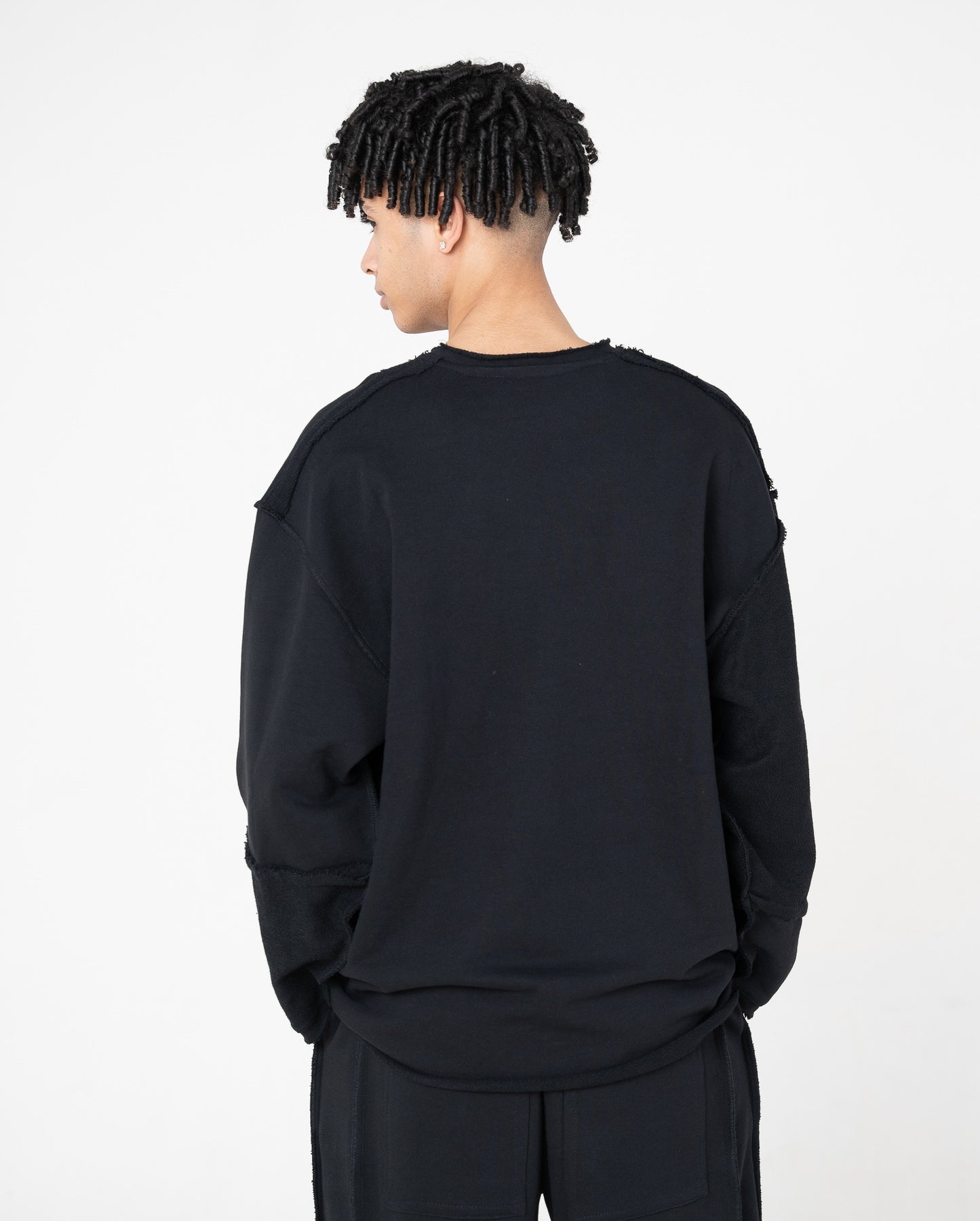 FERE STUDIOS SWEATER IN BLACK