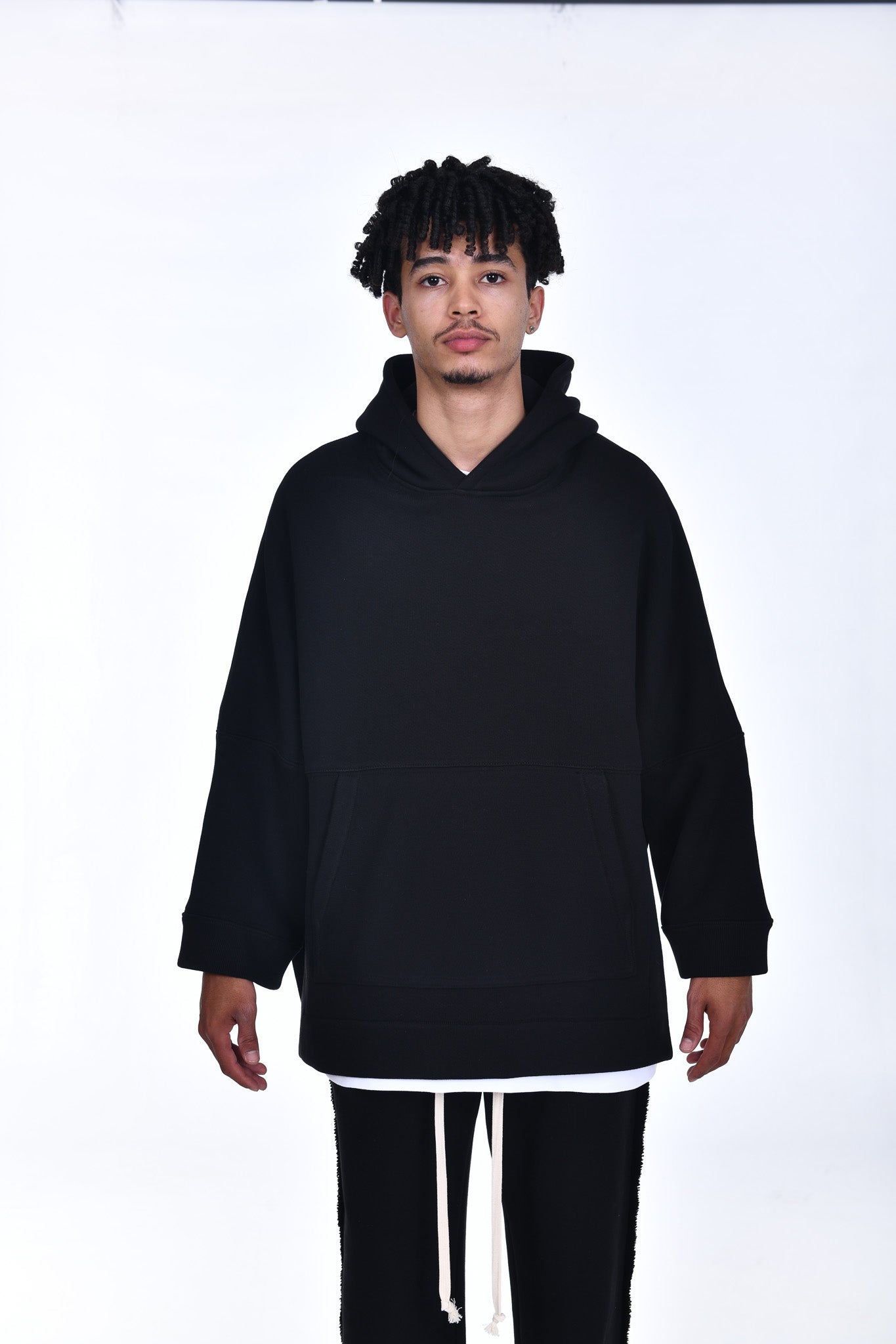 FERE STUDIOS PONCHO HOODIE PURE COTTON IN BLACK